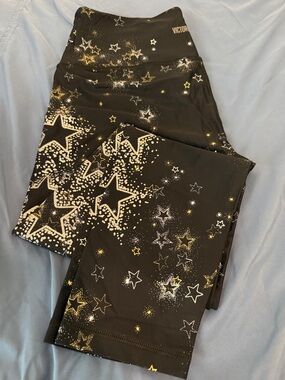 Victoria's Secret Black Leggings with Gold, White & Silver Star Print